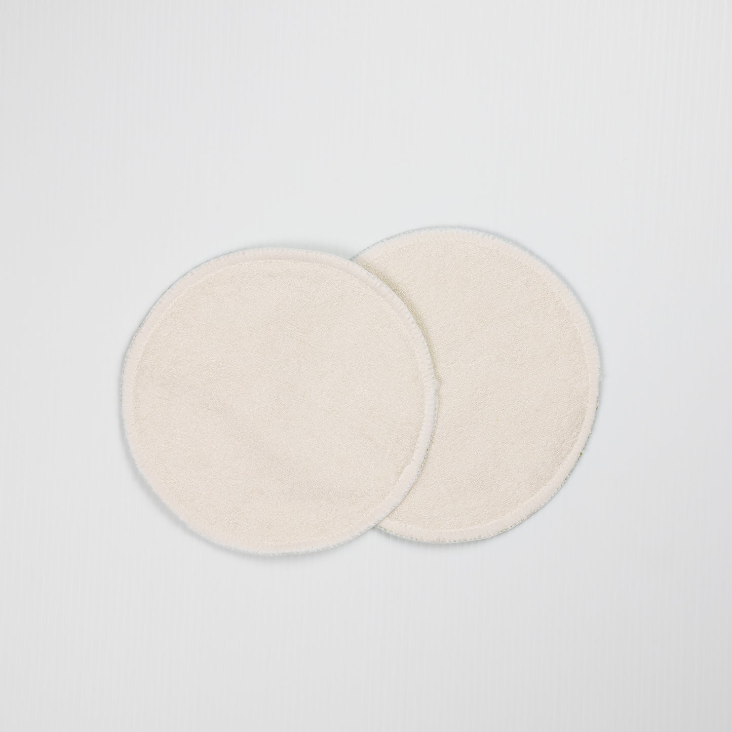 White Reusable Breast Pads. Backside of Reusable Nursing Pads