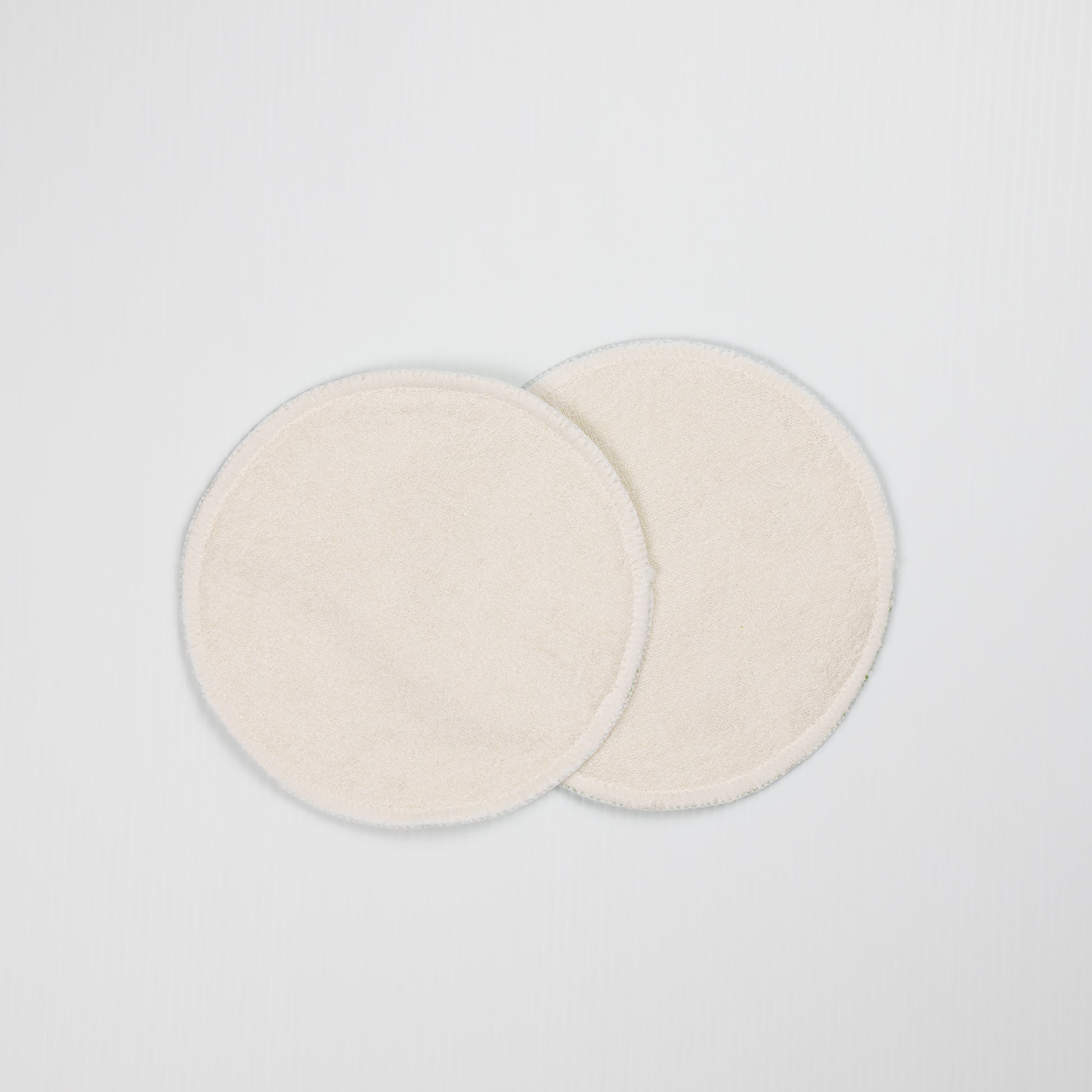 White Reusable Breast Pads. Backside of Reusable Nursing Pads