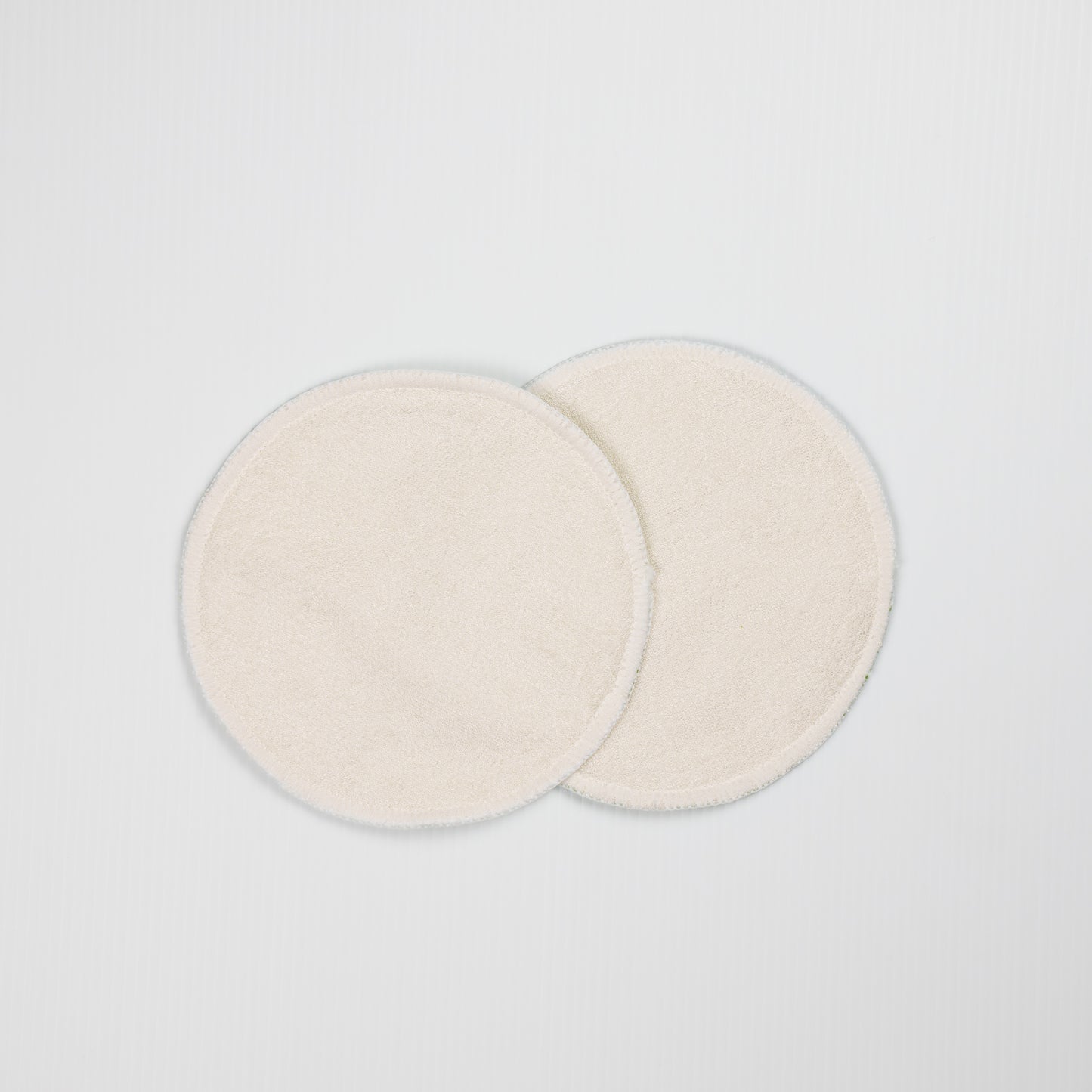 White Reusable Breast Pads. Backside of Reusable Nursing Pads