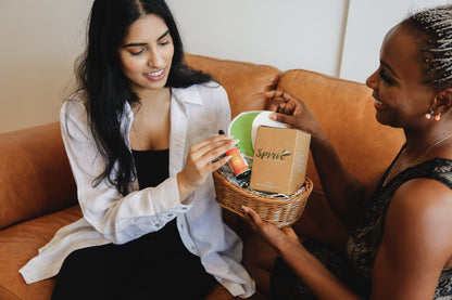 2 women gifting Spirit Maternity care hamper