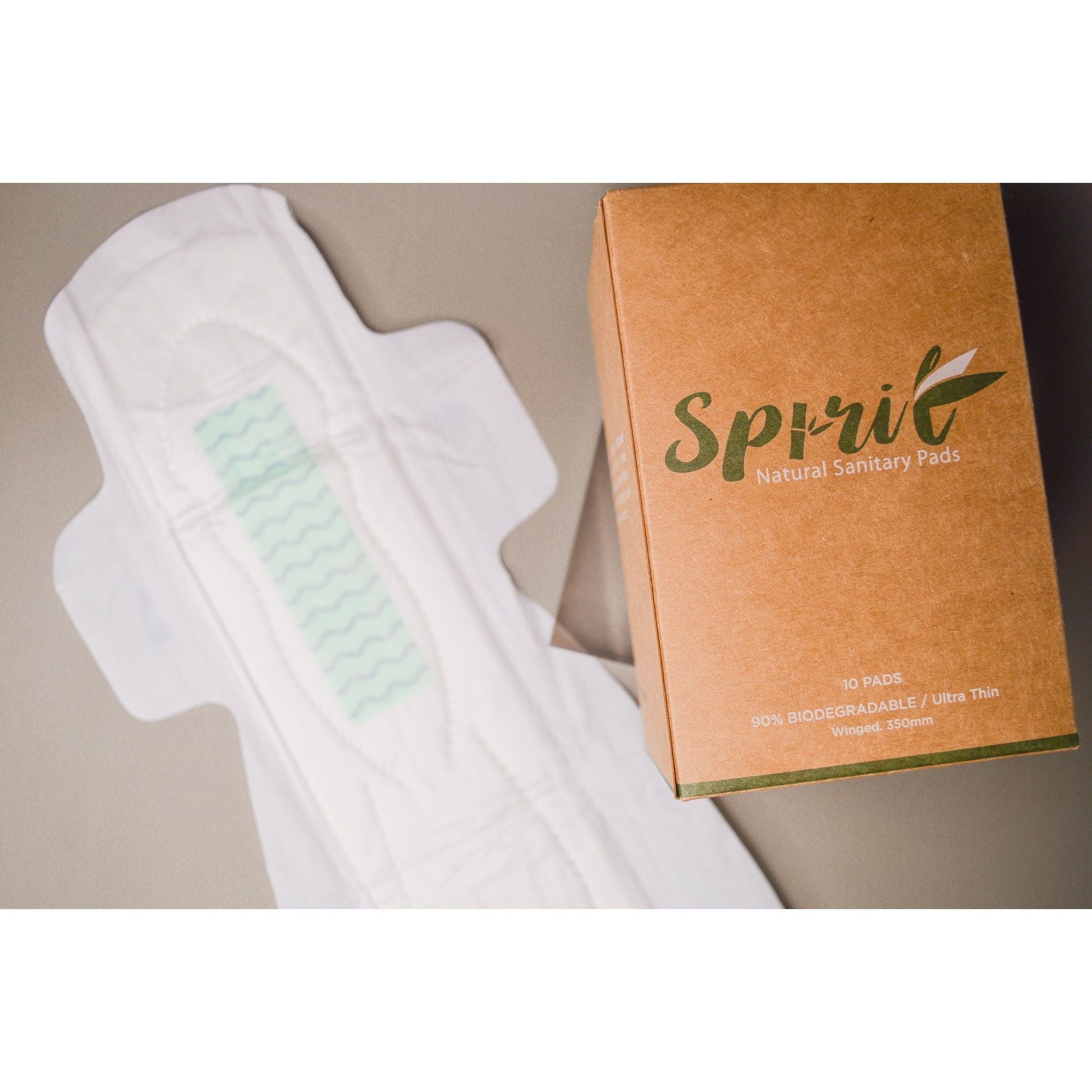 Spirit Sanitary Pads with open Maxi pad. Bamboo Period Pad. Brown and Green