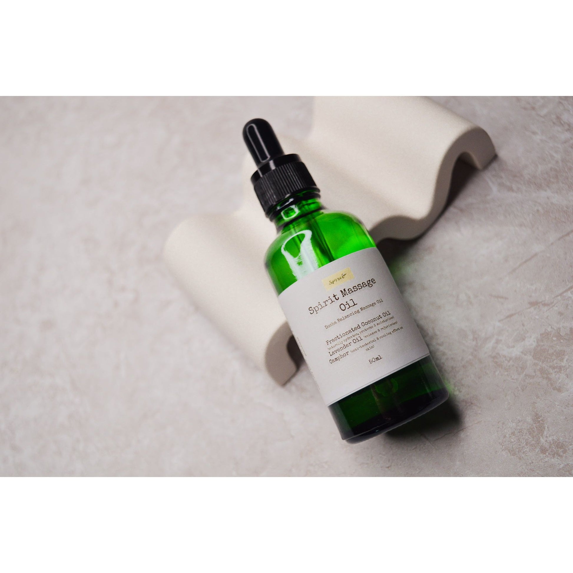 Spirit Massage Oil. Body & Massage Oil. Best Massage Oil in a green bottle.